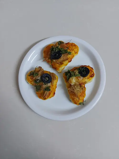 Mini-pizzas en forme de cœur.