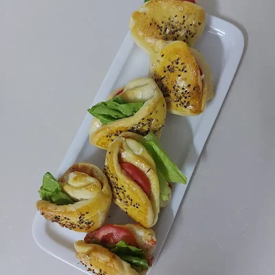 Mini sandwichs tomate-salade